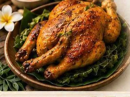 Balinese ayam betutu, a whole roast chicken with Balinese spice on cassava leaves