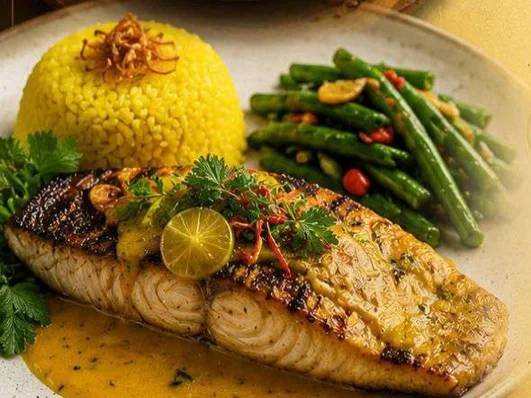 Grilled barramundi in Balinese yellow sauce with turmeric rice and sauteed green beans